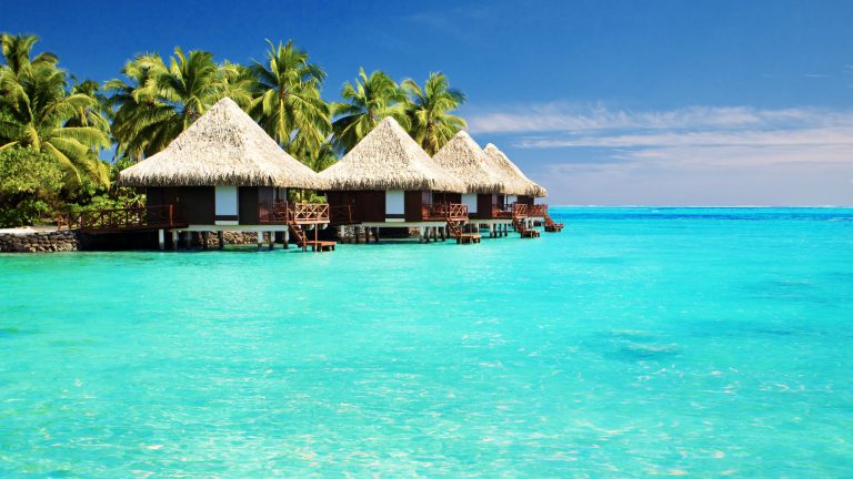 Over water bungalows with steps into amazing green lagoon